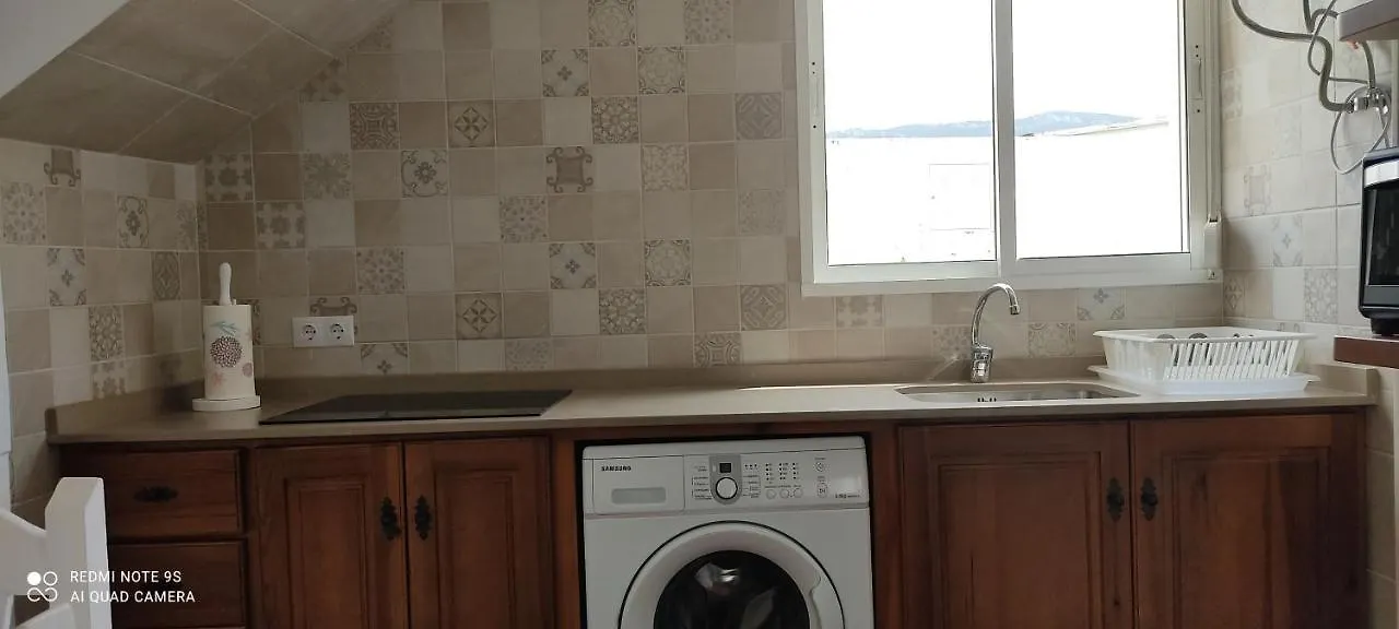 Apartamentos Bolonia - M A N U E L A